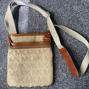Micheal Kors tan cross body bag